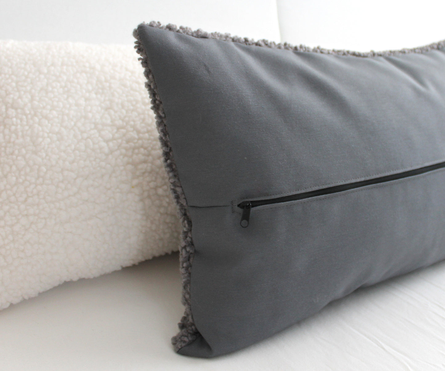 Create a cozy look to your space with this Off-white Cozy Teddy Boucle Throw Pillow Cover. The classic texture adds a warm and inviting touch to your sofa or bed. Comfortable to touch makes it perfect for snuggling up with!