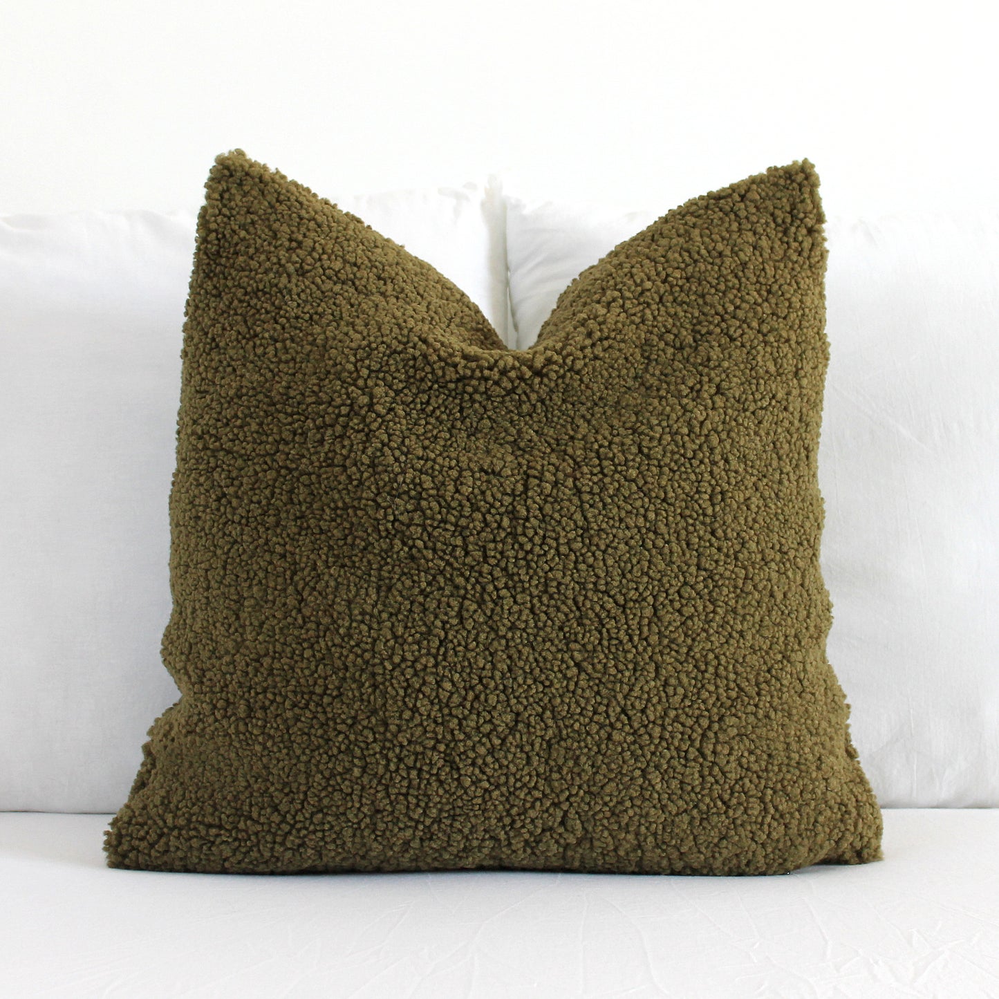 Create a cozy look to your space with this Army Green Cozy Teddy Boucle Throw Pillow Cover. The classic texture adds a warm and inviting touch to your sofa or bed. Comfortable to touch makes it perfect for snuggling up with!