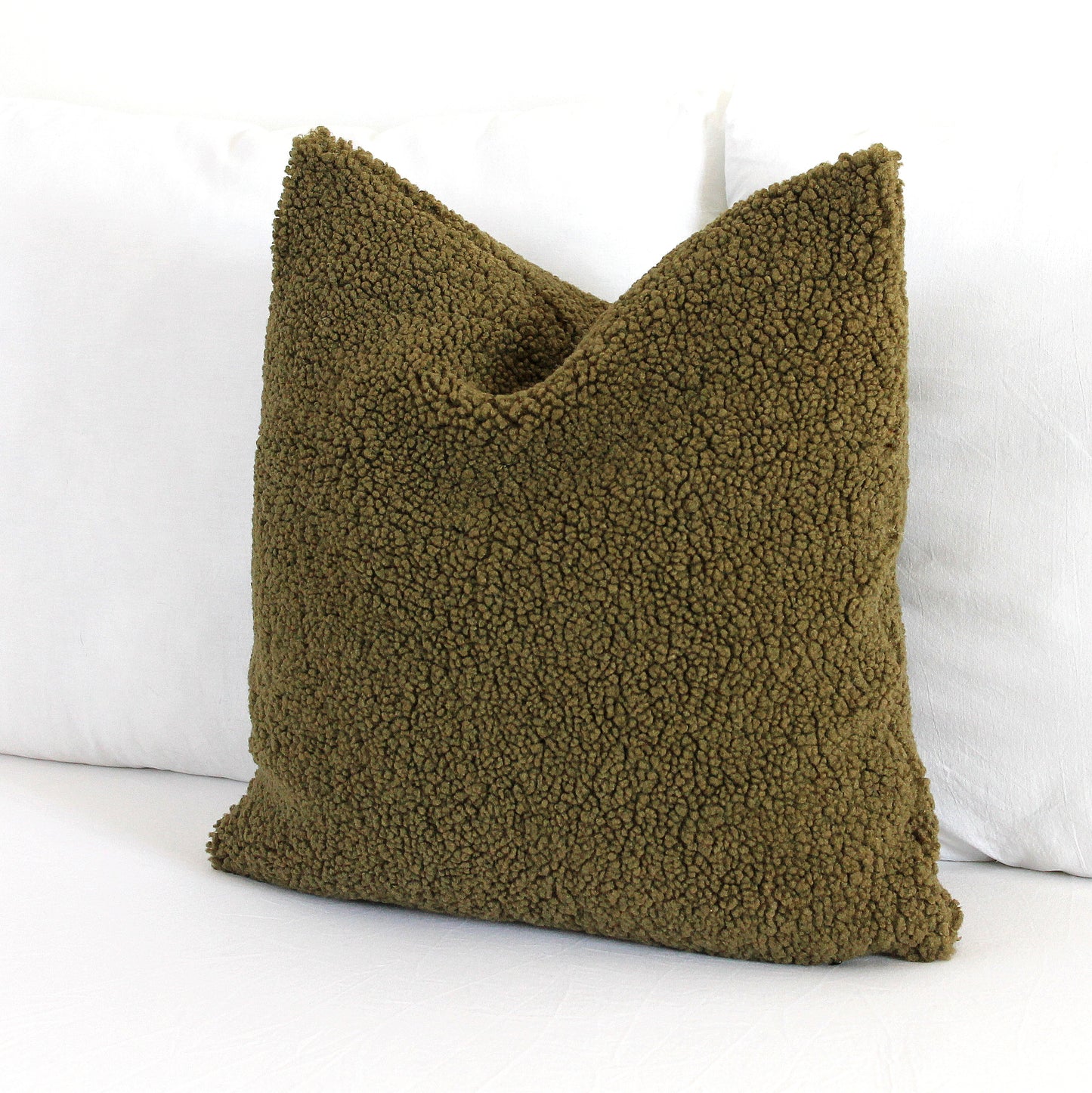 Create a cozy look to your space with this Army Green Cozy Teddy Boucle Throw Pillow Cover. The classic texture adds a warm and inviting touch to your sofa or bed. Comfortable to touch makes it perfect for snuggling up with!