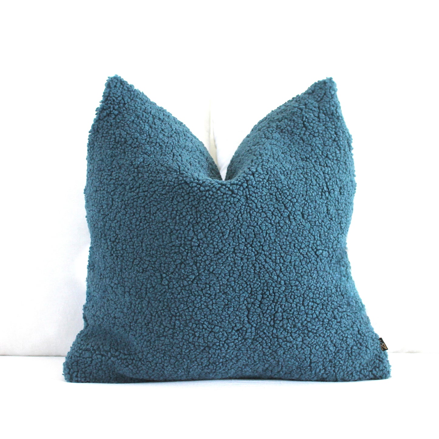 Create a cozy look to your space with this Petrol Blue Cozy Teddy Boucle Throw Pillow Cover. The classic texture adds a warm and inviting touch to your sofa or bed. Comfortable to touch makes it perfect for snuggling up with!