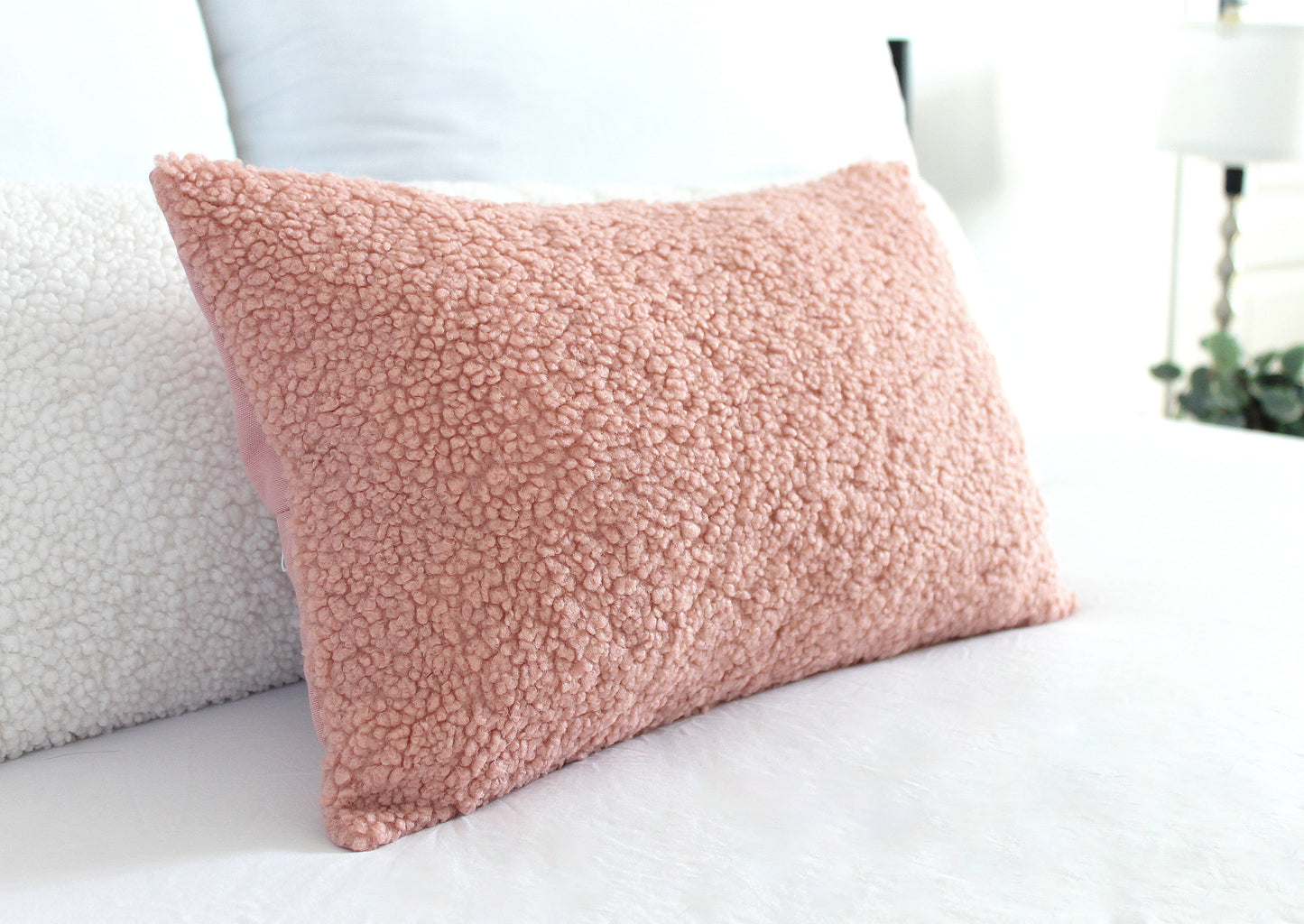 Create a cozy look to your space with this Blush Cozy Teddy Boucle Throw Pillow Cover. The classic texture adds a warm and inviting touch to your sofa or bed. Comfortable to touch makes it perfect for snuggling up with!