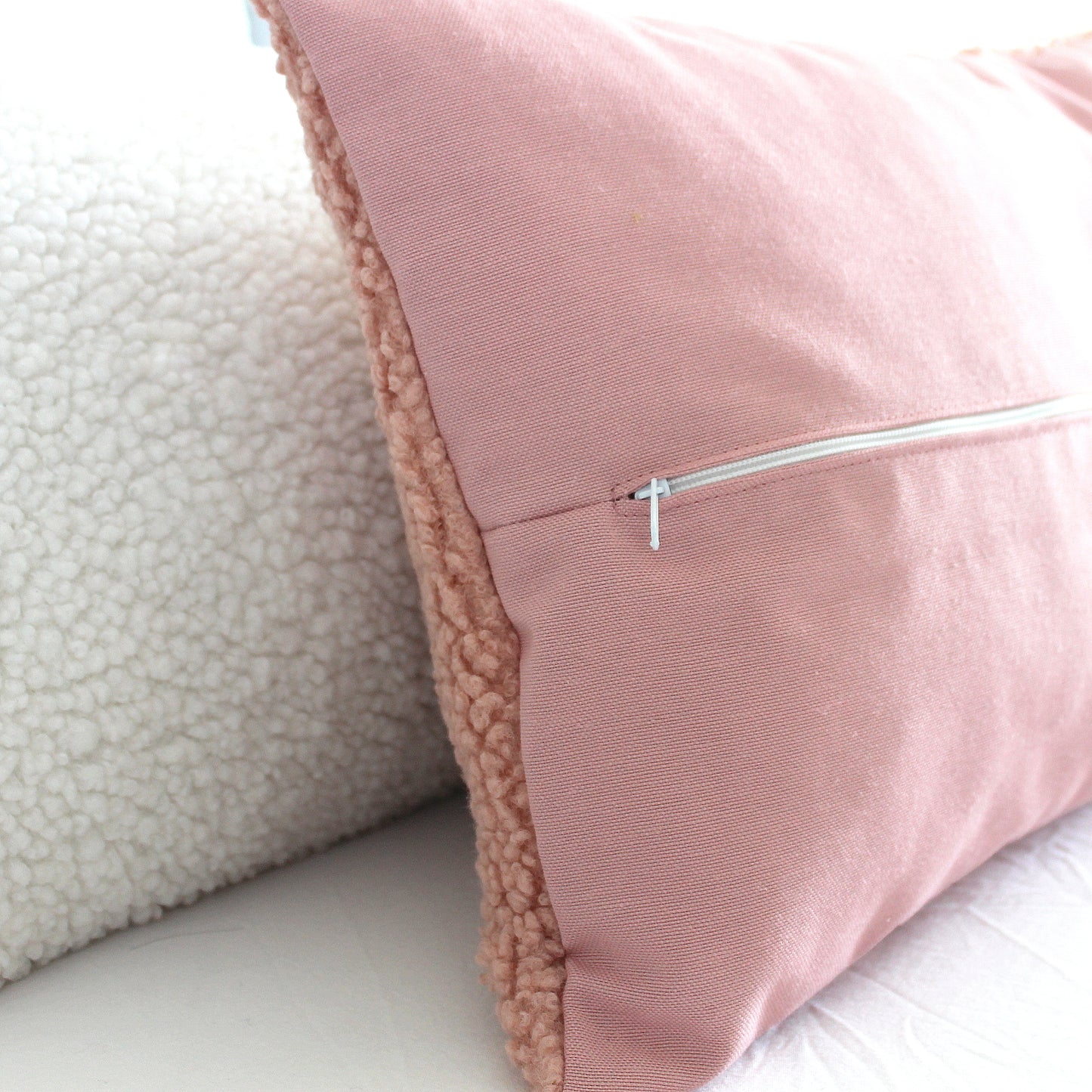 Create a cozy look to your space with this Blush Cozy Teddy Boucle Throw Pillow Cover. The classic texture adds a warm and inviting touch to your sofa or bed. Comfortable to touch makes it perfect for snuggling up with!