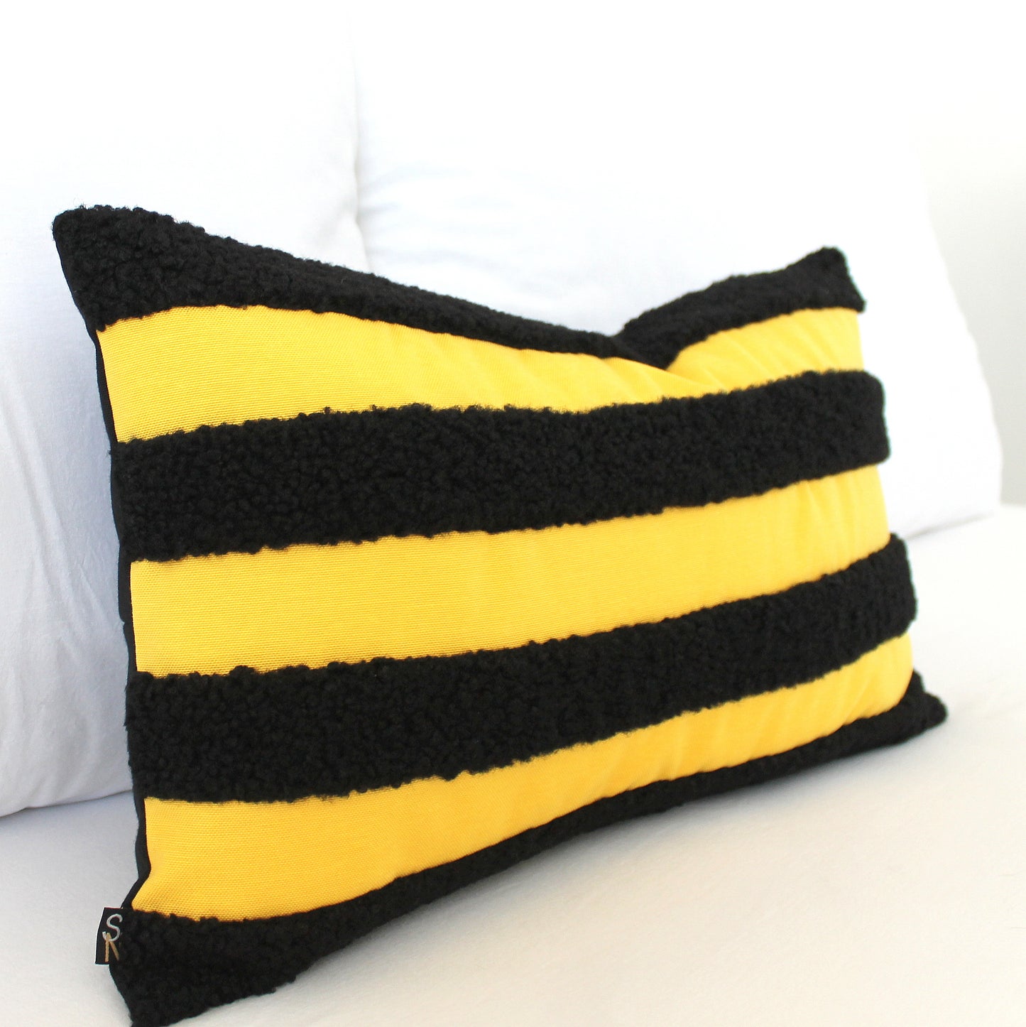 Black and Yellow Boucle Teddy Textured Throw Pillow Cover. Its playful texture and bold bee-inspired colors add a quirky twist to classic style. Bee different and add this unique, cheerful accent to your decor!