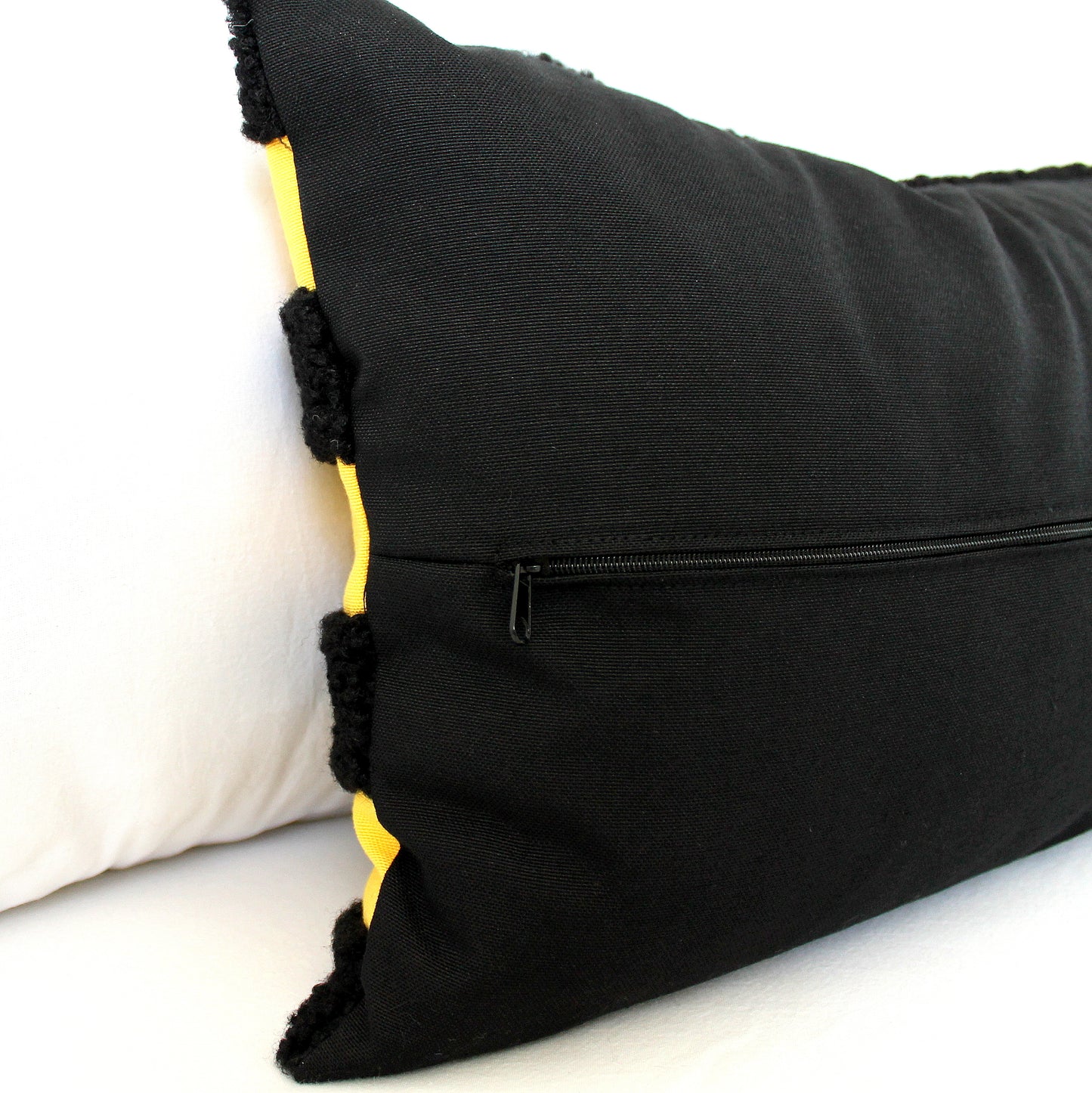 Black and Yellow Boucle Teddy Textured Throw Pillow Cover. Its playful texture and bold bee-inspired colors add a quirky twist to classic style. Bee different and add this unique, cheerful accent to your decor!