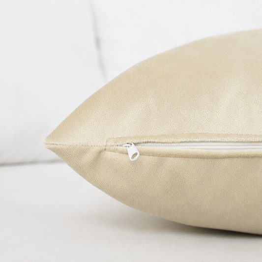 Bone beige velvet pillow cover in warm sand neutral tone, luxury cream cushion for modern minimalist decor.