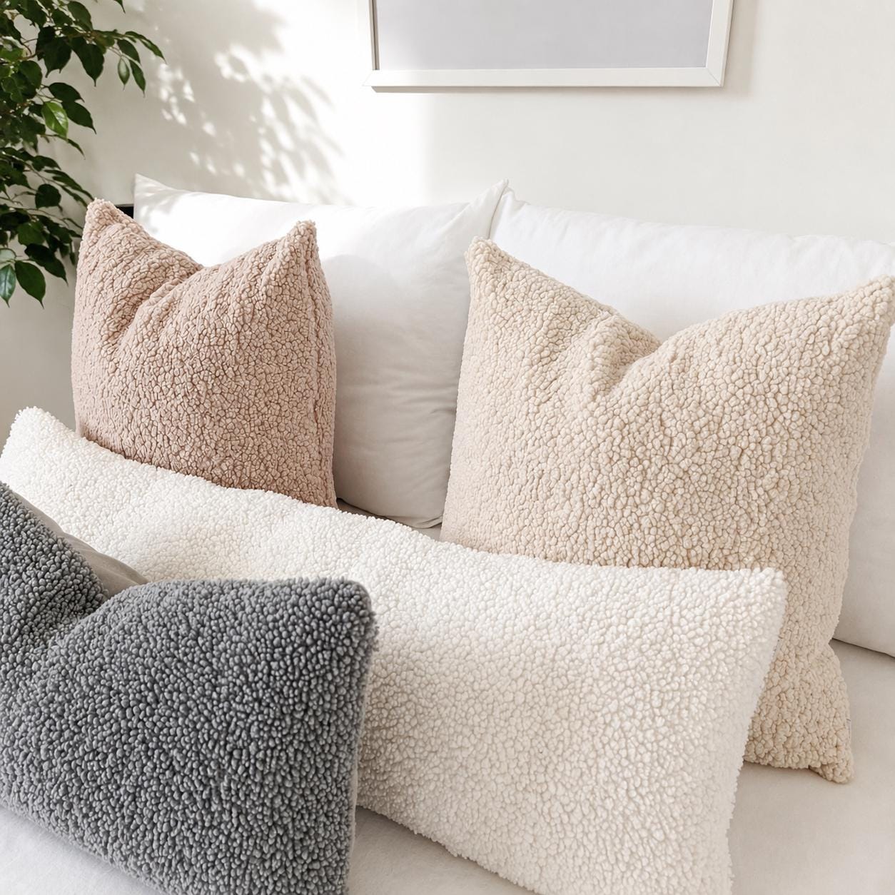 Champagne bouclé throw pillow cover styled in a cozy Scandinavian-inspired home