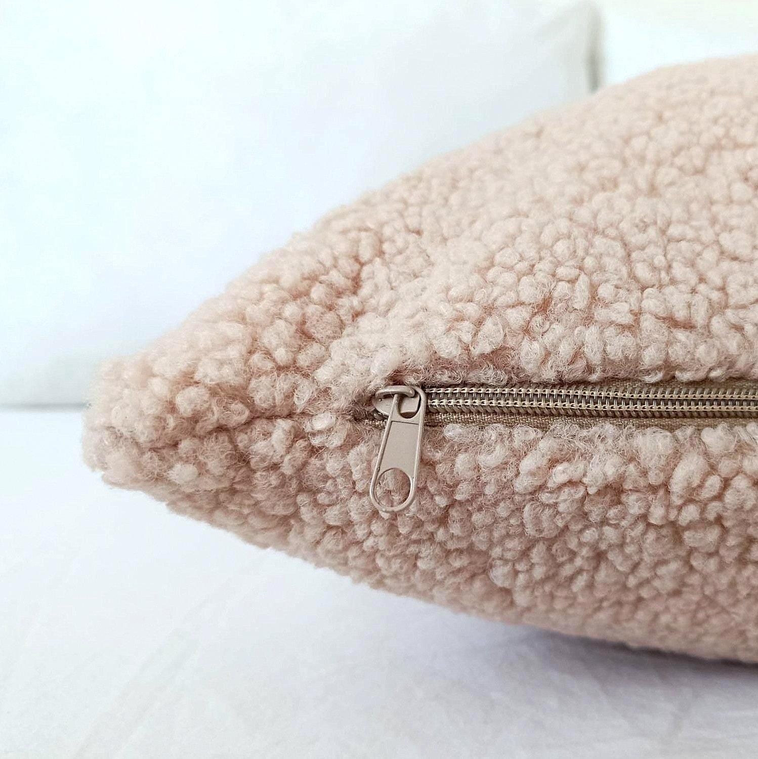 Champagne teddy bouclé pillow cover showing its warm neutral champagne color