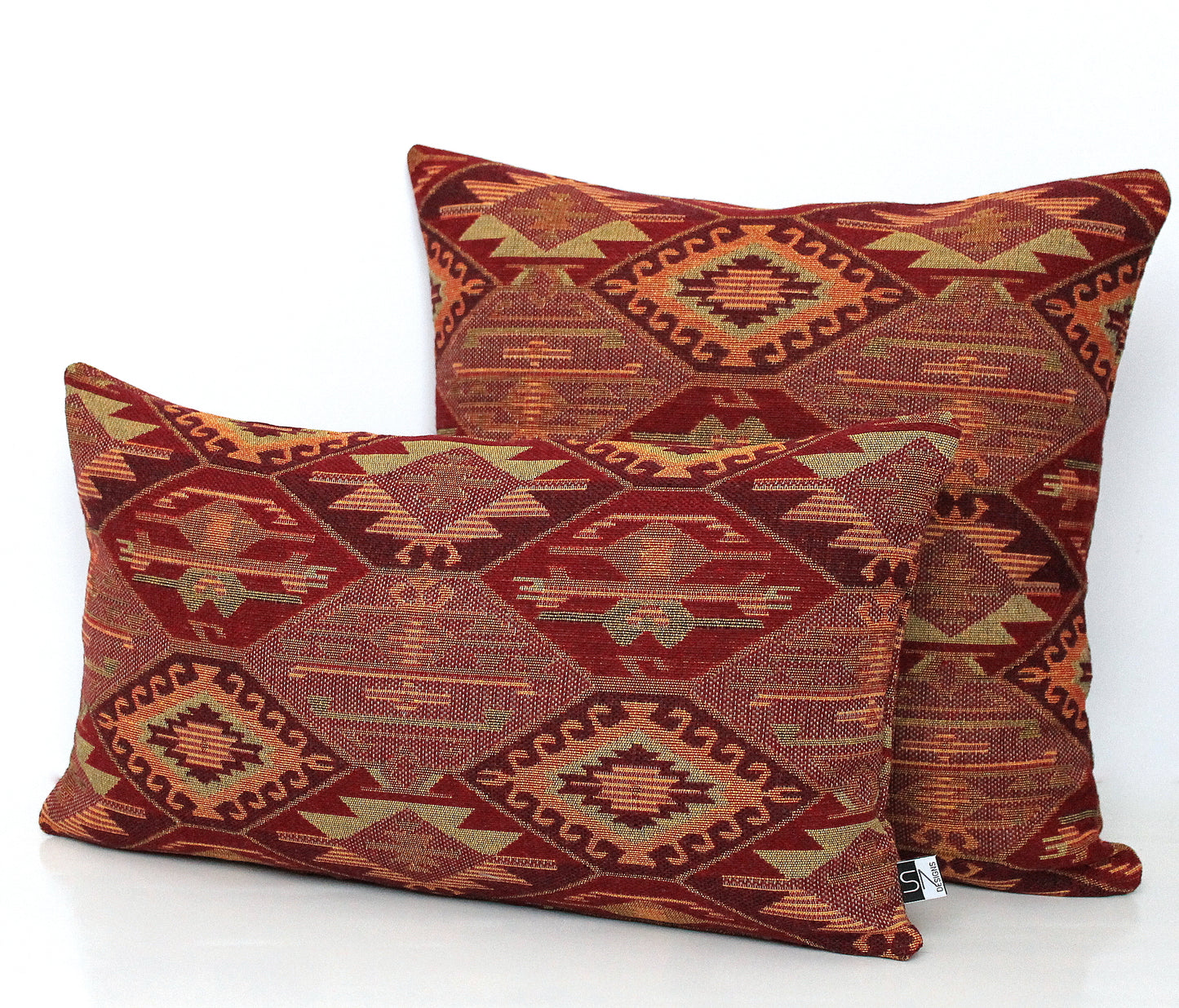Geometric burgundy kilim fabric detail on lumbar pillow cover