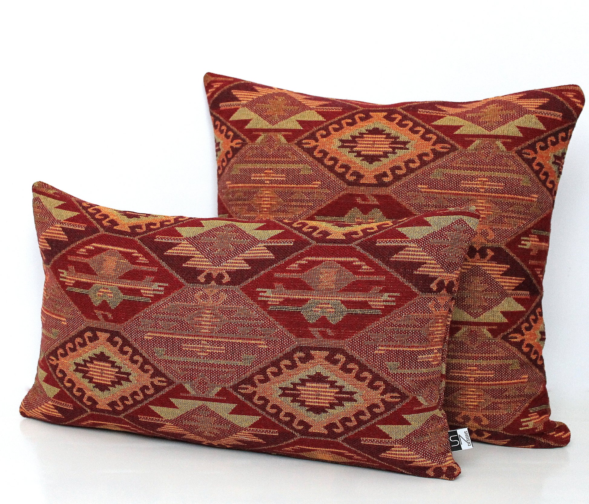 Geometric burgundy kilim fabric detail on lumbar pillow cover