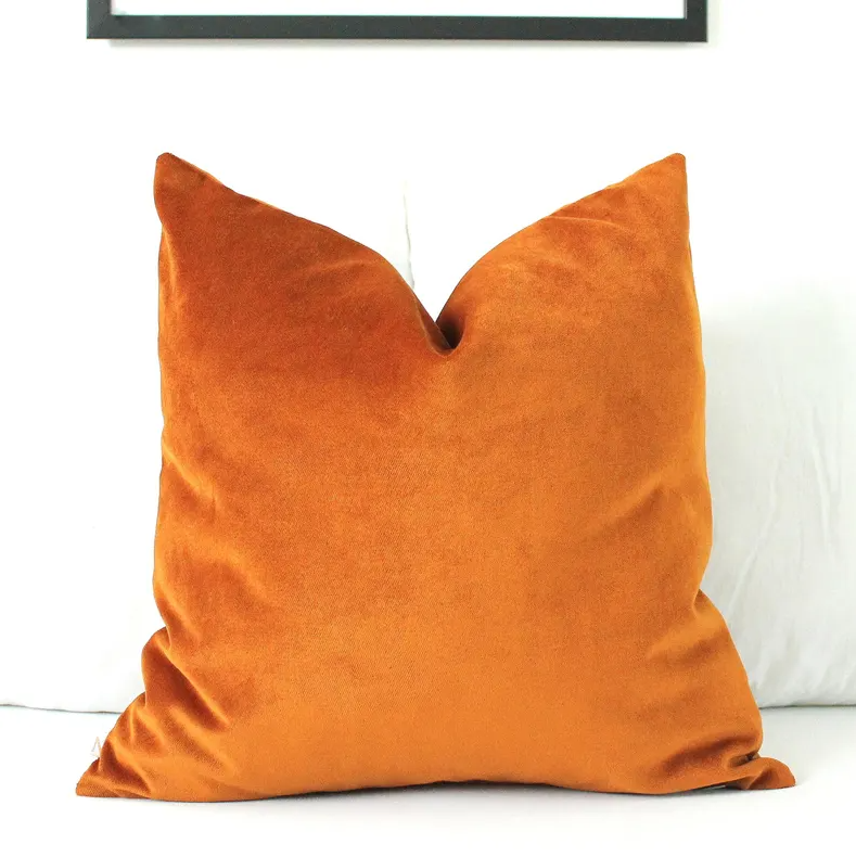 burnt orange velvet pillow cover in warm rust terracotta tone, cozy accent cushion for neutral sofa and autumn home styling