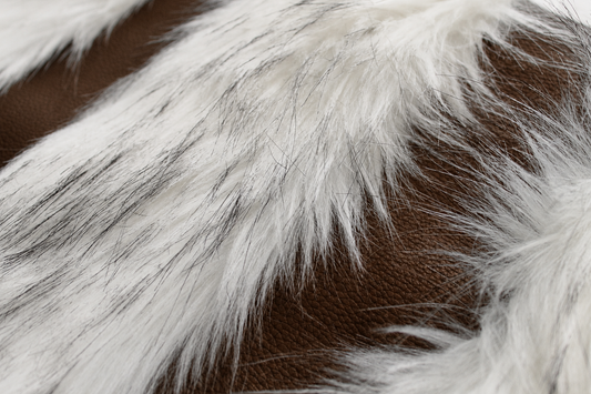 Chestnut brown textured faux leather and Snow Fox faux fur detail on luxury pillow cover