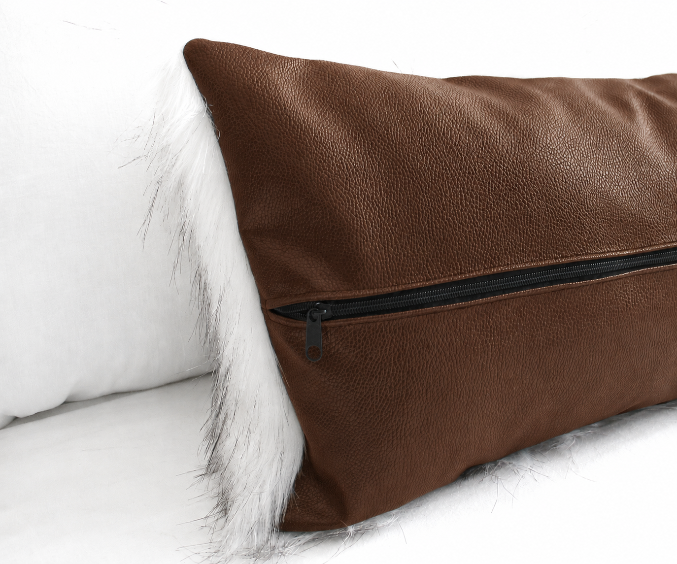 Chestnut brown faux leather pillow cover with black center-back zipper and Snow Fox faux fur