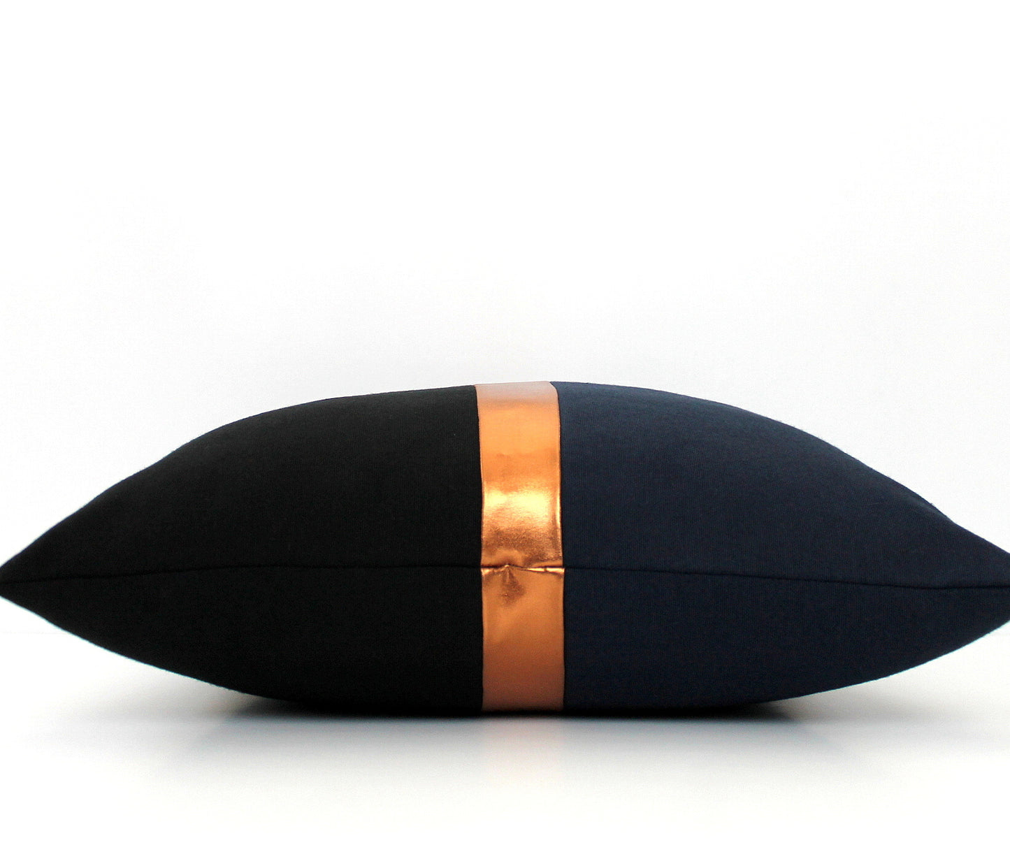 These affordable pillow covers are a must if you are looking for a touch of elegance in your home. The navy blue and black cotton is made to pop with a custom stripe of silver, gold or copper.