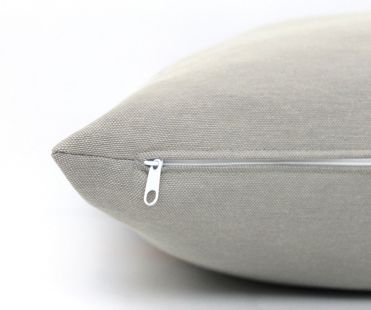 These affordable pillow covers are a must if you are looking for a touch of luxury in your home. The light grey cotton is made to pop with a custom stripe of silver, gold or copper or shiny black.